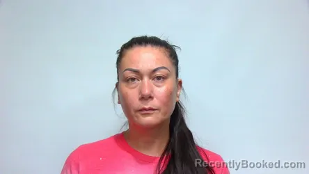 Mugshot of CONNIE KIM MOORE booked in Suwannee County, Florida on May 18, 2026