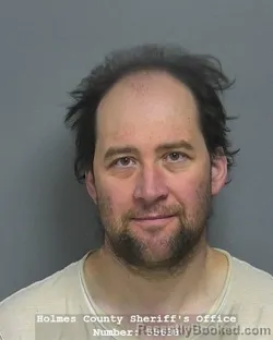 Mugshot of DANIEL E SWARTZENTRUBER