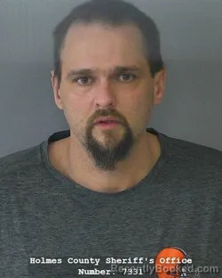 Mugshot of ANDREW MICHAEL WHITMAN booked in Holmes County, Ohio on March 16, 2026