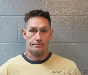 Mugshot of TRAVIS JAMES BUTLER booked in Huron County, Ohio on May 9, 2026