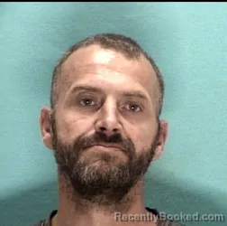 Mugshot of SHAUN K EVANS booked in Licking County, Ohio on May 13, 2026