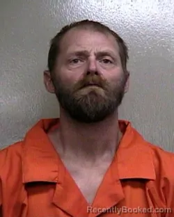 Mugshot of MARCUS E SCHUMACHER