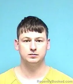 Mugshot of JOSHUA D REYNOLDS