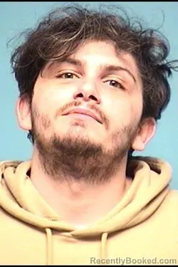 Mugshot of JUSTIN M RAHRIG