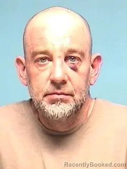 Mugshot of NICHOLAS M BUETTNER