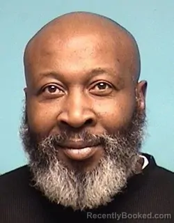 Mugshot of JOHN D MERRITT