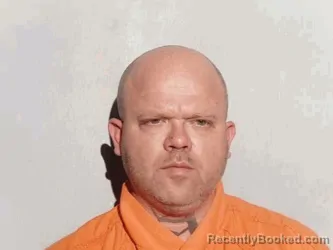 Mugshot of Aaron Douglas Amrhein booked in Lucas County, Ohio on August 22, 2026