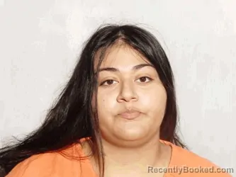 Mugshot of Crystal Irene Benavides booked in Lucas County, Ohio on October 7, 2026