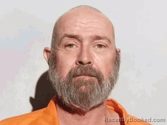 Mugshot of Eric James Bucher booked in Lucas County, Ohio on October 4, 2026