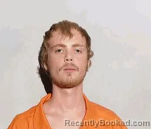 Mugshot of Logan James Dominique booked in Lucas County, Ohio on July 31, 2026