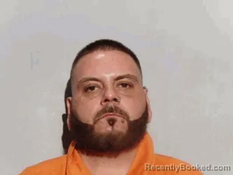 Mugshot of Travis Melvin Groszewski booked in Lucas County, Ohio on September 26, 2026