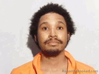 Mugshot of Johnny Lee Jr Johnson booked in Lucas County, Ohio on October 2, 2026