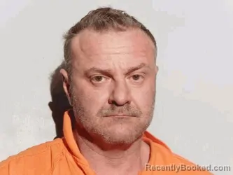Mugshot of Dennis Petar Kotevski booked in Lucas County, Ohio on October 2, 2026
