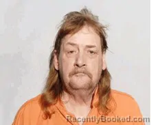 Mugshot of Curtis Alan Leach booked in Lucas County, Ohio on August 5, 2026