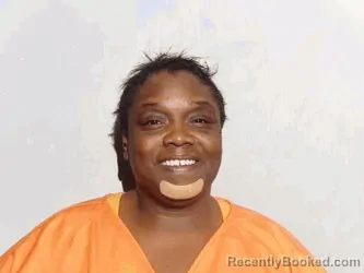 Mugshot of Kimberly Tameaka Moore booked in Lucas County, Ohio on August 19, 2026