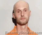 Mugshot of Matthew Scott Miller booked in Lucas County, Ohio on July 21, 2026