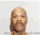 Mugshot of Charles Darian Pou booked in Lucas County, Ohio on July 23, 2026