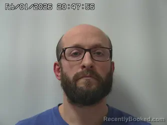 Mugshot of DEVON TOMEY