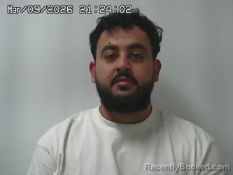 Mugshot of HASSAM AL HROUT