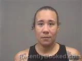 Mugshot of JASMINE D FLORES