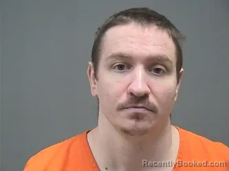 Mugshot of JUSTIN MOORE booked in Mahoning County, Ohio on June 24, 2026