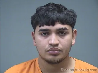Mugshot of Bryan Flores-Molina booked in Mahoning County, Ohio on August 22, 2026