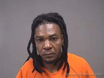 Mugshot of Guems Romain booked in Mahoning County, Ohio on August 29, 2026