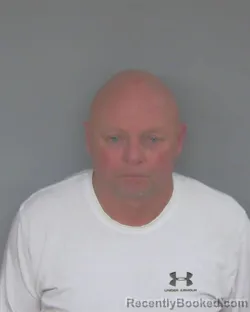 Mugshot of JOHN DAVID SWEIGART