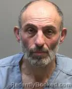 Mugshot of DLYAVER RUSTEMOVICH ASANOV booked in Montgomery County, Ohio on March 14, 2026