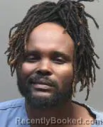 Mugshot of JOHN EZY MAHIRWE booked in Montgomery County, Ohio on March 13, 2026