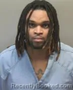 Mugshot of RICKY DEVAN SIMMONS booked in Montgomery County, Ohio on March 15, 2026