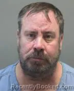 Mugshot of JASON TENURE AMOS booked in Montgomery County, Ohio on March 27, 2026