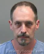 Mugshot of JUSTIN MICHAEL NEVILLE booked in Montgomery County, Ohio on June 12, 2026