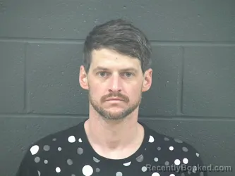 Mugshot of DEVIN KUHN