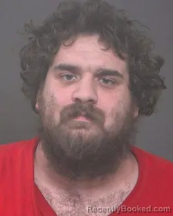 Mugshot of JOHN JACOB RAINE