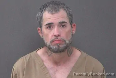 Mugshot of CHRISTOPHER ADEM LYONS booked in Muskingum County, Ohio on June 25, 2026