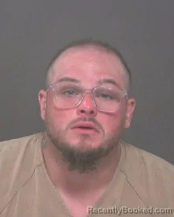 Mugshot of TYLER LECURTIS SMITH booked in Muskingum County, Ohio on July 6, 2026