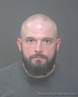 Mugshot of Kyle William Conrad booked in Muskingum County, Ohio on August 18, 2026