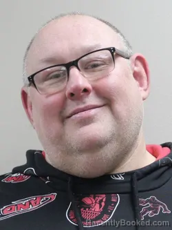 Mugshot of JOHN WAYNE DAUGHNEY