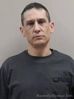 Mugshot of JUSTIN RAY FLORES