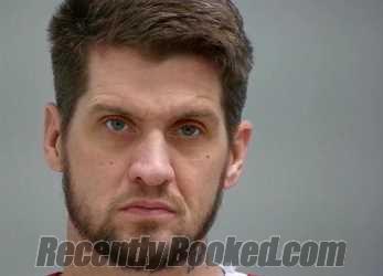 Mugshot of JUSTIN CURTIS PUMMELL