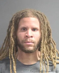 Mugshot of OFILI CHIKAMGBOLU