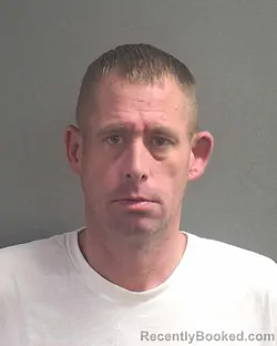 Mugshot of JONATHAN M MOORE