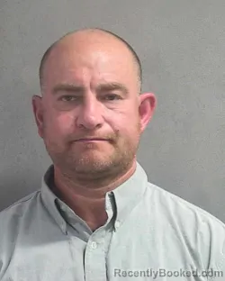 Mugshot of RALEIGH M CAREY