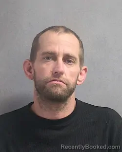 Mugshot of JUSTIN K KANIA