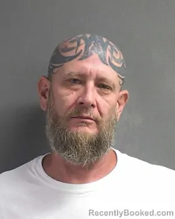 Mugshot of WAYNE DOSS BARNETT booked in Volusia County, Florida on March 12, 2026