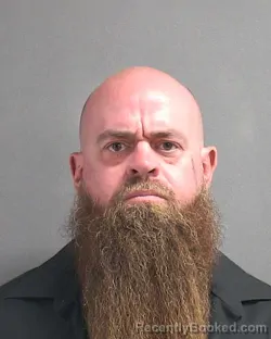 Mugshot of DANIEL WILLIAM MACUMBER booked in Volusia County, Florida on March 12, 2026