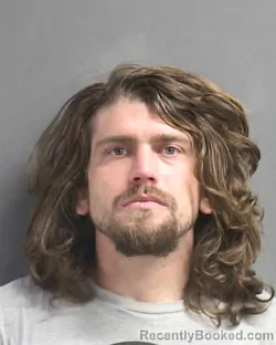 Mugshot of THAI BARRET OLEA booked in Volusia County, Florida on March 13, 2026