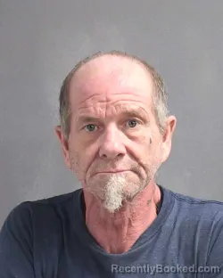 Mugshot of MOREL SCOTT FLORES