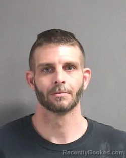 Mugshot of ANDREW H COMBS